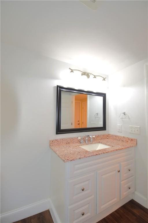 92 Trout Dr, Middletown, RI 02842 - bathroom featuring vanity and wood finished floors