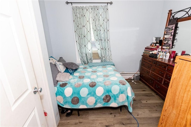 467 Plainfield St, Providence, RI 02909 - bedroom with wood finished floors and baseboard heating