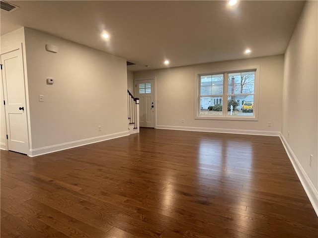 59 Recess Ln, Warwick, RI 02889 - spare room featuring stairs, dark wood-style floors, and recessed lighting