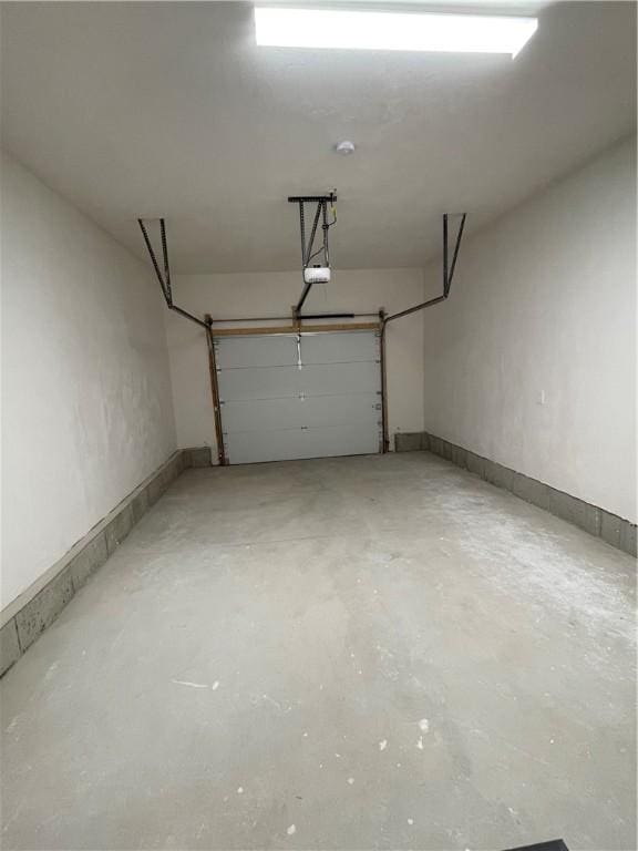 59 Recess Ln, Warwick, RI 02889 - garage featuring a garage door opener
