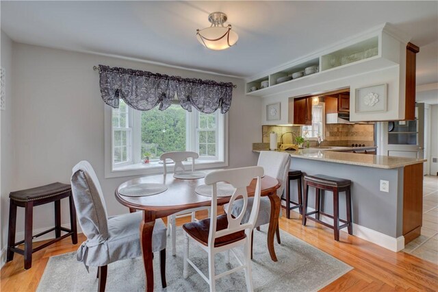 426 Buxton St, North Smithfield, RI 02896 - dining room with light wood-style flooring