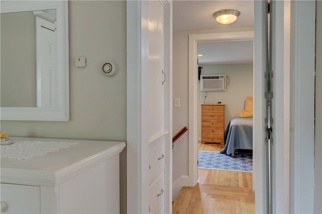 426 Buxton St, North Smithfield, RI 02896 - bathroom featuring a wall mounted air conditioner and wood finished floors