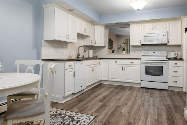 2970 Mendon Rd Unit 154, Cumberland, RI 02864 - kitchen with white appliances, decorative backsplash, dark wood-type flooring, and dark countertops