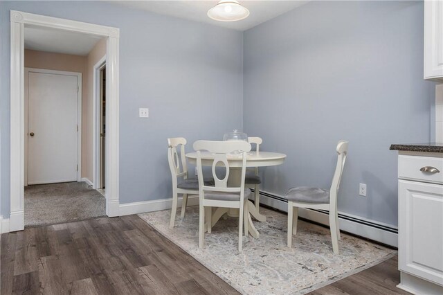 2970 Mendon Rd Unit 154, Cumberland, RI 02864 - dining area with dark wood finished floors and baseboards