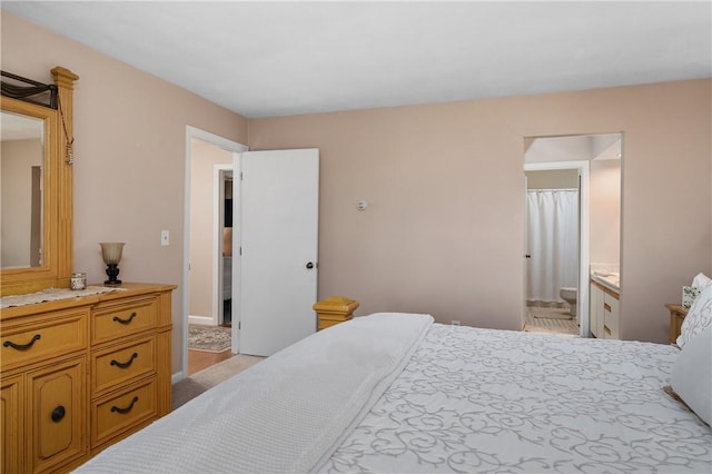2970 Mendon Rd Unit 154, Cumberland, RI 02864 - bedroom featuring baseboards and ensuite bath