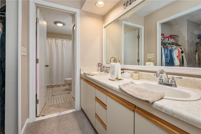 2970 Mendon Rd Unit 154, Cumberland, RI 02864 - bathroom with double vanity and a walk in closet