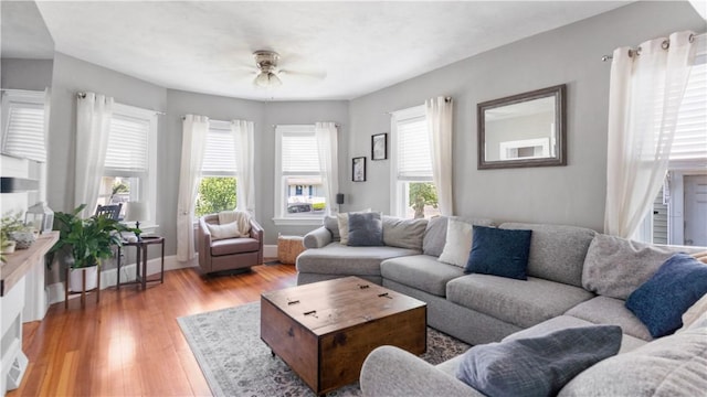 280 Woodbine St, Cranston, RI 02910 - living room featuring plenty of natural light, ceiling fan, and light wood-style flooring