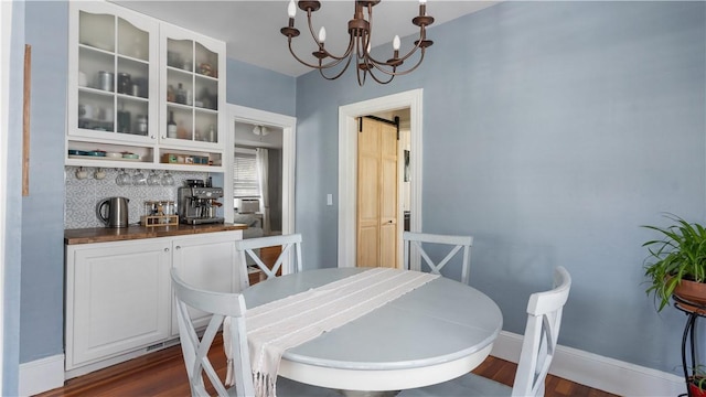 280 Woodbine St, Cranston, RI 02910 - dining room with a chandelier and dark wood-style floors