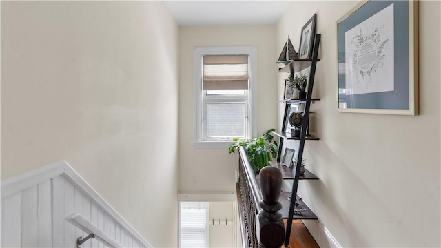 280 Woodbine St, Cranston, RI 02910 - corridor with an upstairs landing, wainscoting, and wood finished floors