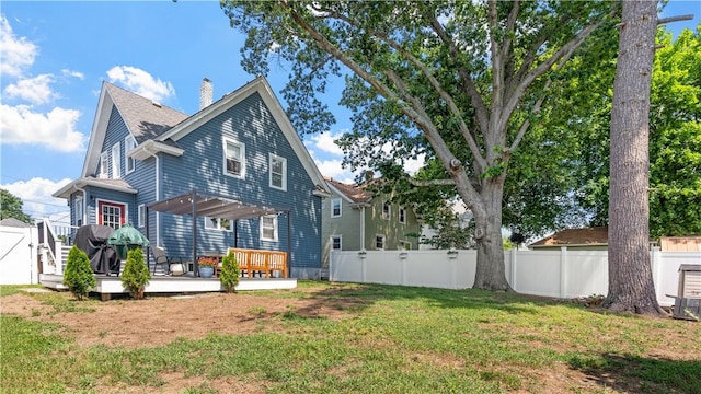 280 Woodbine St, Cranston, RI 02910 - rear view of property with a deck, a fenced backyard, a chimney, and a gate