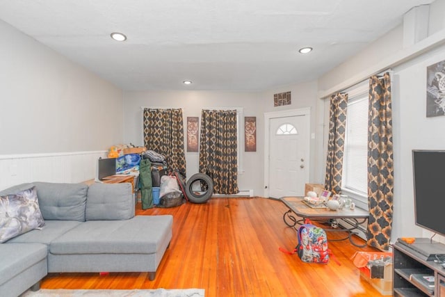 12 Lenox St, Cumberland, RI 02864 - living area featuring a wainscoted wall, wood finished floors, and recessed lighting