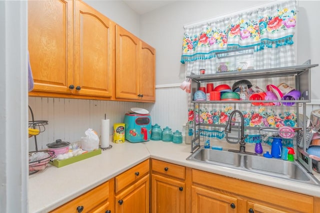 12 Lenox St, Cumberland, RI 02864 - kitchen featuring light countertops and wainscoting