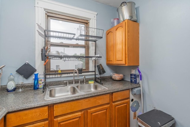 12 Lenox St, Cumberland, RI 02864 - kitchen with dark countertops and brown cabinets