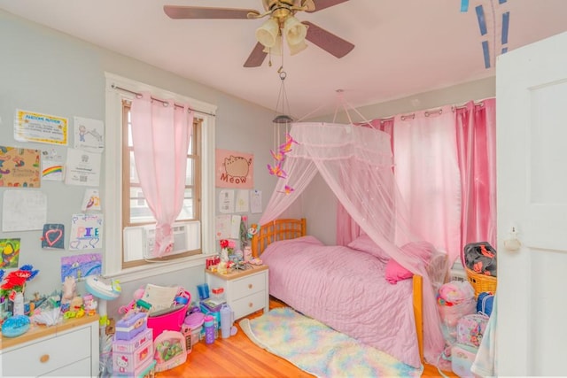 12 Lenox St, Cumberland, RI 02864 - bedroom with wood finished floors, a ceiling fan, and cooling unit