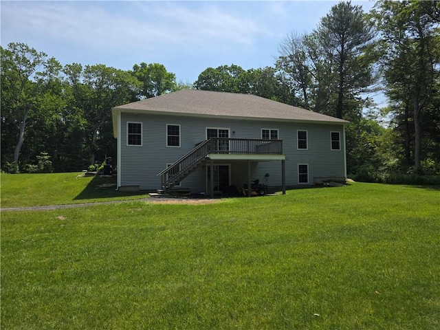 475 Danielson Pike, Scituate, RI 02857 - back of house with stairs, a deck, and a yard
