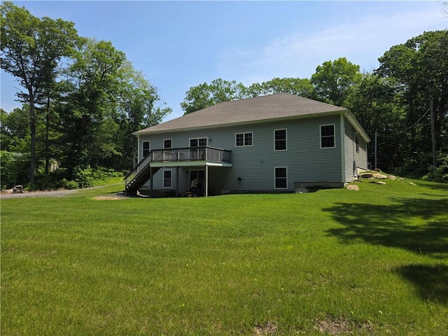475 Danielson Pike, Scituate, RI 02857 - back of house with stairs, a wooden deck, and a lawn