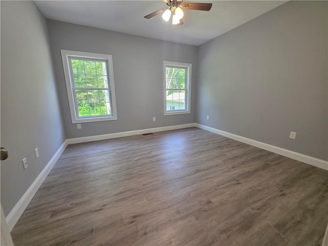 475 Danielson Pike, Scituate, RI 02857 - unfurnished room with ceiling fan and dark wood-style floors