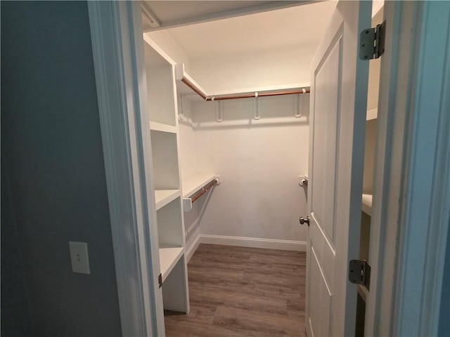 475 Danielson Pike, Scituate, RI 02857 - walk in closet with dark wood-style floors