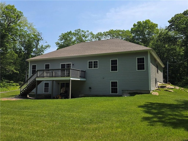 475 Danielson Pike, Scituate, RI 02857 - back of property featuring stairway, a deck, and a yard