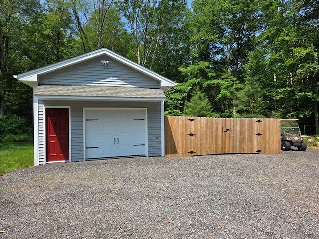 475 Danielson Pike, Scituate, RI 02857 - detached garage featuring driveway, a gate, and view of scattered trees