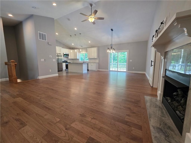475 Danielson Pike, Scituate, RI 02857 - unfurnished living room featuring ceiling fan, wood finished floors, a high end fireplace, a chandelier, and high vaulted ceiling