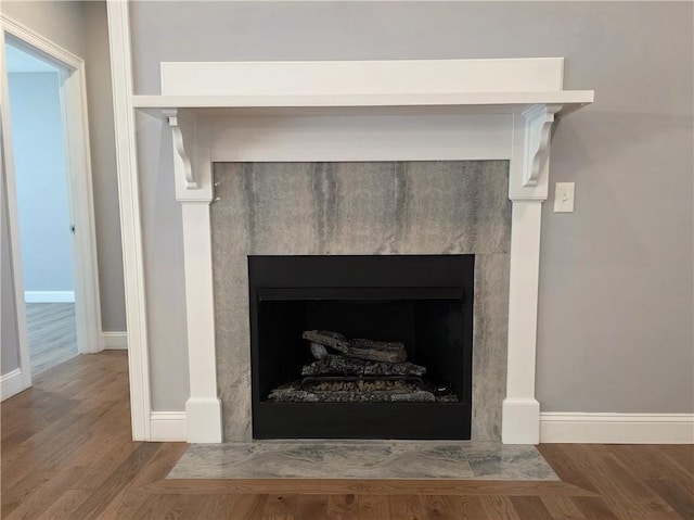 475 Danielson Pike, Scituate, RI 02857 - detailed view of a fireplace with flush hearth and wood finished floors
