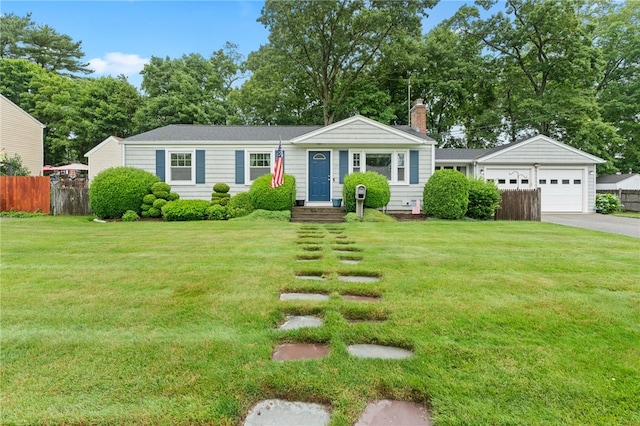 15 Rutland St, Warwick, RI 02888 - view of front of home with a chimney and asphalt driveway