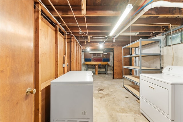 15 Rutland St, Warwick, RI 02888 - unfinished below grade area with refrigerator and separate washer and dryer