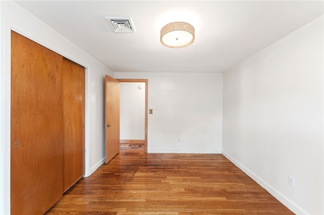 15 Rutland St, Warwick, RI 02888 - unfurnished room featuring wood finished floors and baseboards