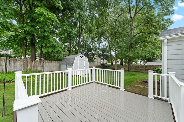 15 Rutland St, Warwick, RI 02888 - wooden terrace featuring a storage unit and a fenced backyard
