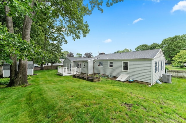 15 Rutland St, Warwick, RI 02888 - rear view of property featuring a storage shed and a deck