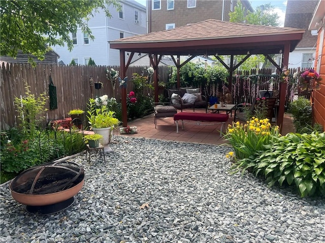 64 Elmdale Ave, Providence, RI 02909 - fenced backyard with a gazebo, a patio area, and an outdoor living space
