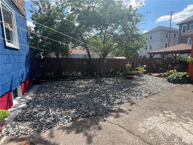 64 Elmdale Ave, Providence, RI 02909 - fenced yard featuring a gazebo