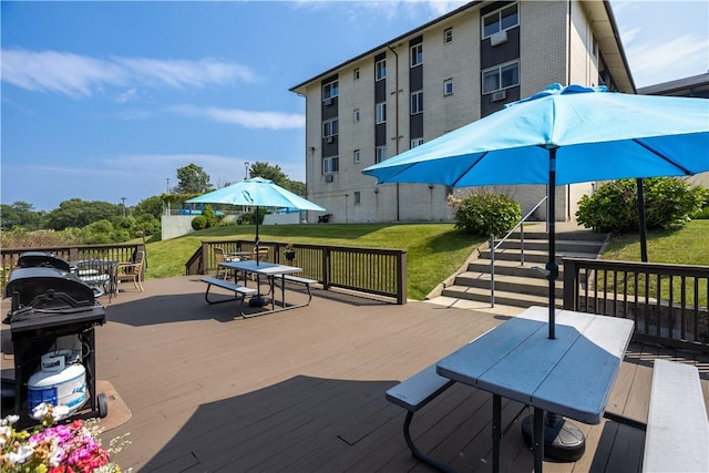 400 Narragansett Pkwy Unit Ei 2, Warwick, RI 02888 - deck with outdoor dining area, grilling area, and a yard