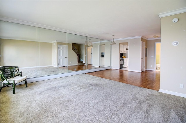 400 Narragansett Pkwy Unit Ei 2, Warwick, RI 02888 - unfurnished living room with dark carpet and crown molding