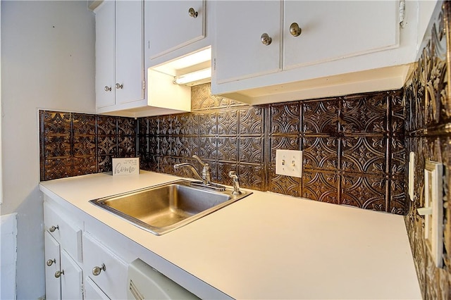 400 Narragansett Pkwy Unit Ei 2, Warwick, RI 02888 - kitchen with decorative backsplash, light countertops, and white cabinetry