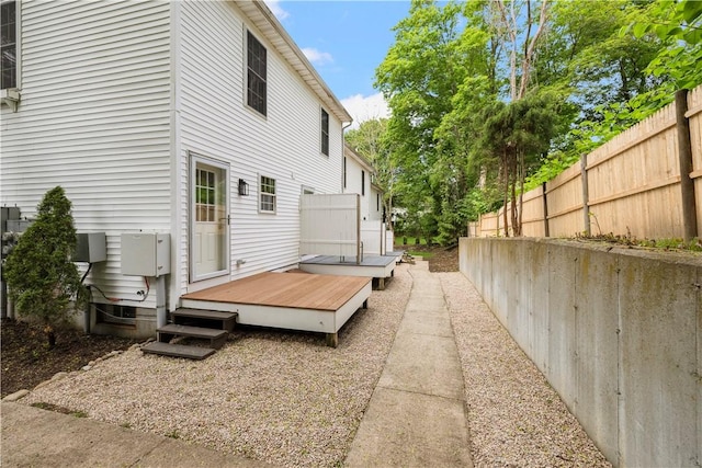 45 Cherry Ln Unit C, South Kingstown, RI 02879 - rear view of property with a deck