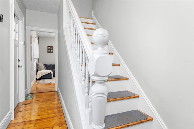229 Roger Williams Ave, East Providence, RI 02916 - staircase featuring wood-type flooring and baseboards