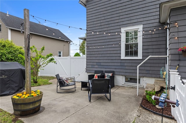 229 Roger Williams Ave, East Providence, RI 02916 - fenced backyard featuring a patio area and area for grilling