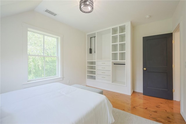 26 Old Stone Church Rd, Little Compton, RI 02837 - bedroom with light wood finished floors and vaulted ceiling