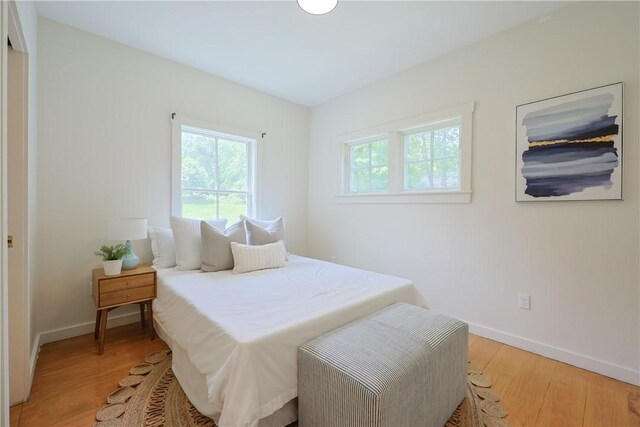 26 Old Stone Church Rd, Little Compton, RI 02837 - bedroom featuring light wood-type flooring and baseboards