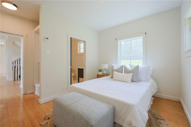 26 Old Stone Church Rd, Little Compton, RI 02837 - bedroom featuring light wood-style flooring and ensuite bath