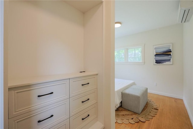 26 Old Stone Church Rd, Little Compton, RI 02837 - interior space featuring a wall mounted AC and light wood-style floors