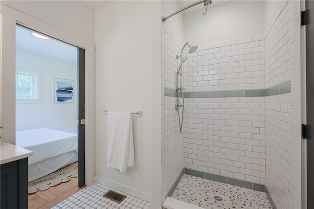 26 Old Stone Church Rd, Little Compton, RI 02837 - bathroom featuring a tile shower, ensuite bathroom, and vanity