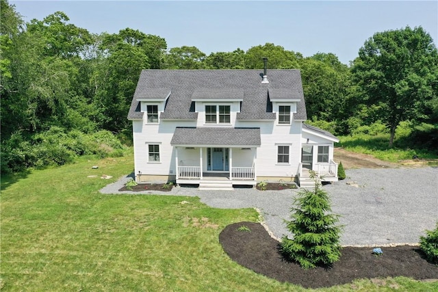 26 Old Stone Church Rd, Little Compton, RI 02837 - rear view of property featuring a porch, a shingled roof, and a lawn
