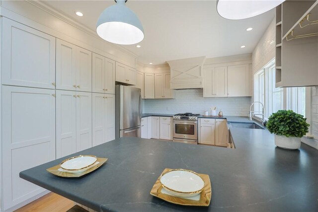 26 Old Stone Church Rd, Little Compton, RI 02837 - kitchen with stainless steel appliances, dark countertops, open shelves, premium range hood, and tasteful backsplash