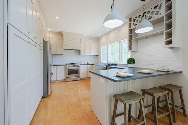 26 Old Stone Church Rd, Little Compton, RI 02837 - kitchen with stainless steel appliances, custom range hood, a peninsula, tasteful backsplash, and open shelves