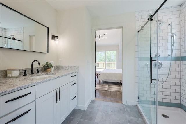 26 Old Stone Church Rd, Little Compton, RI 02837 - ensuite bathroom with vanity, a shower stall, and tile patterned flooring