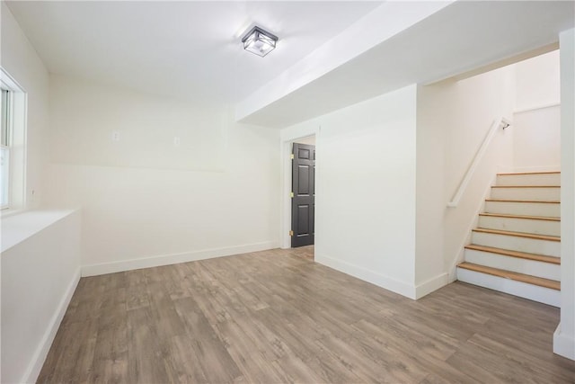 26 Old Stone Church Rd, Little Compton, RI 02837 - empty room with wood finished floors and stairway
