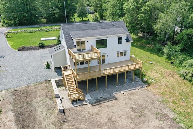 26 Old Stone Church Rd, Little Compton, RI 02837 - back of property with a deck, stairs, a shingled roof, and a lawn